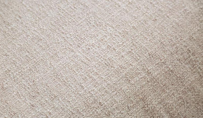 Beige Cane-Side Accent Chair with Bolster Cushions — beige fabric texture close-up