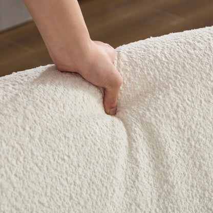 Ivory Curved Sofa with Four Pillows — rounded arm cushion compression demonstration.