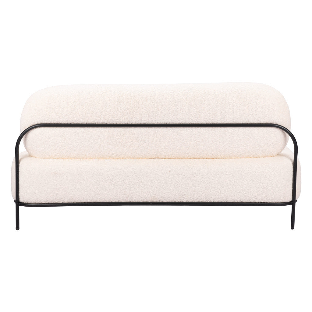 Rear view of the vanilla sofa showing its continuous black steel back and base frame.