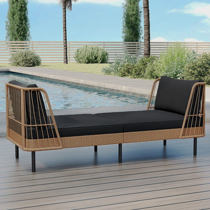 Wicker patio daybed with black seat and back cushions beside a pool