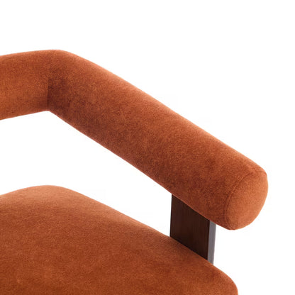 Rust Upholstered Loveseat with Wood Frame — rounded arm and wood frame close-up.