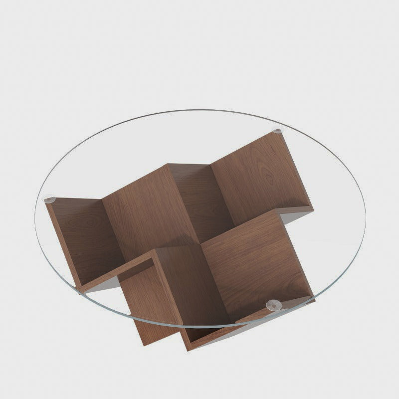 Angled view of the circular glass coffee table on a white background