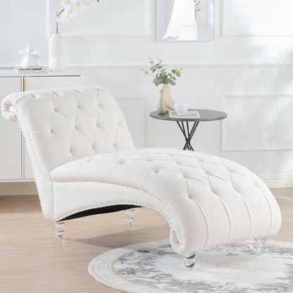 Tufted Chaise Lounge with Clear Legs — ivory chaise in a bright living room.