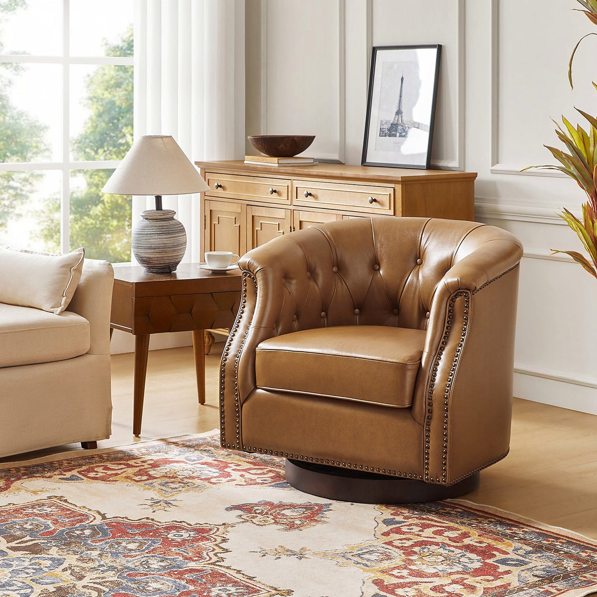 Camel genuine leather Chesterfield swivel rocking armchair with rolled arms