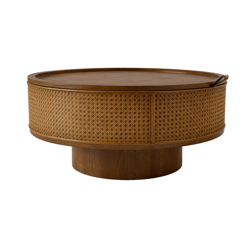 Walnut-brown rattan drum coffee table with woven sides and a low pedestal base
