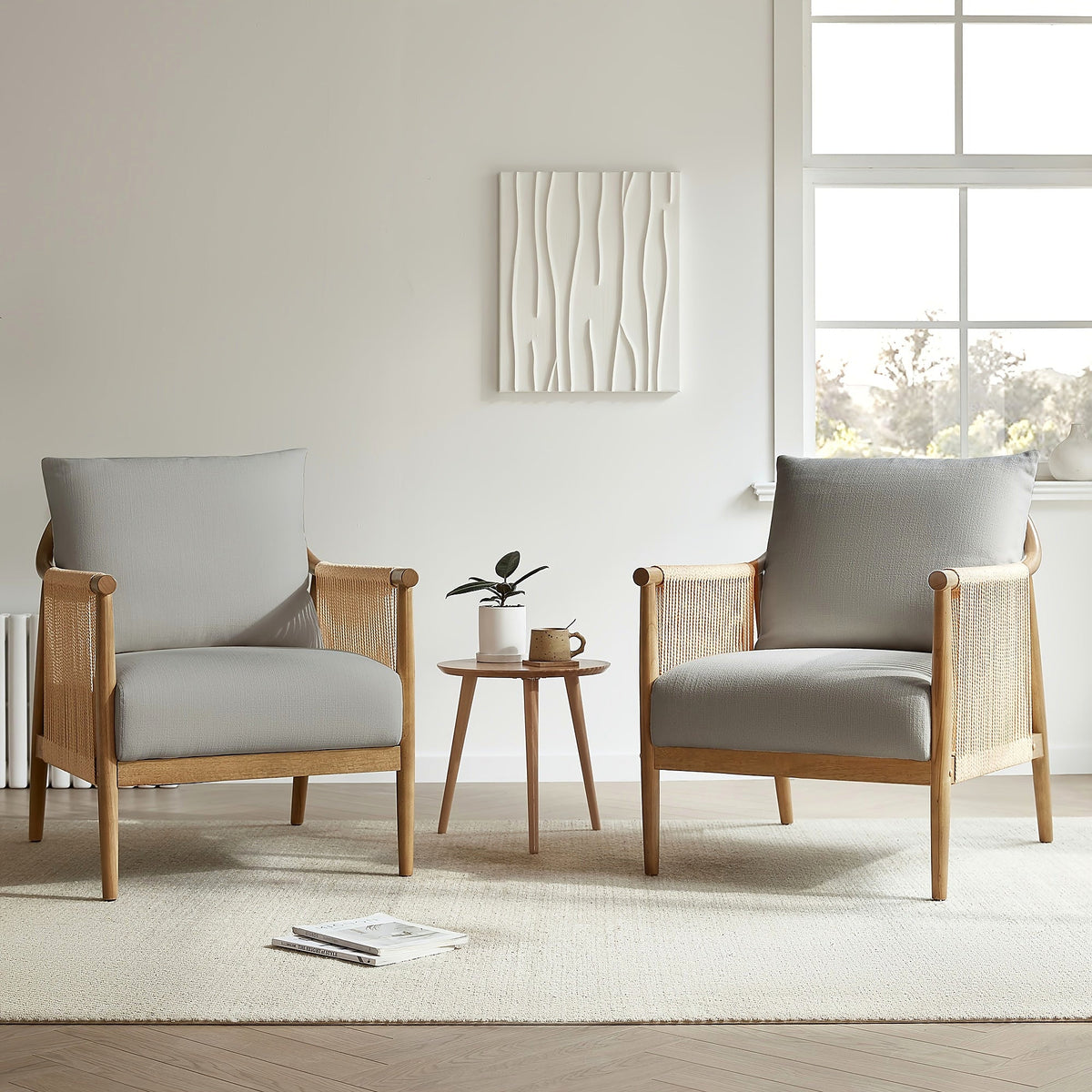 Wood frame accent chair with braided paper cord sides and a light gray cushion