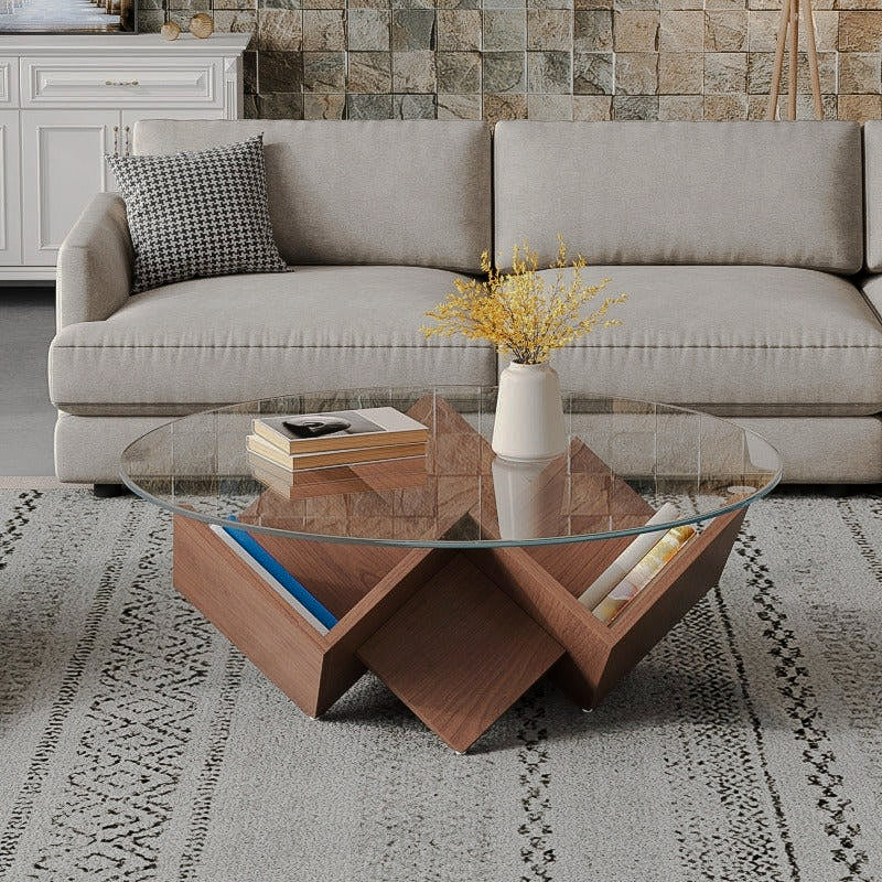 Round clear-glass coffee table with a geometric walnut-look storage base in a living room
