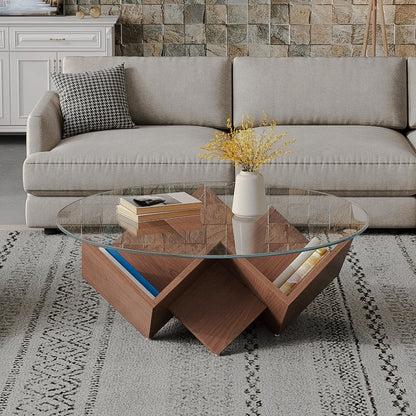 Round clear-glass coffee table with a geometric walnut-look storage base in a living room