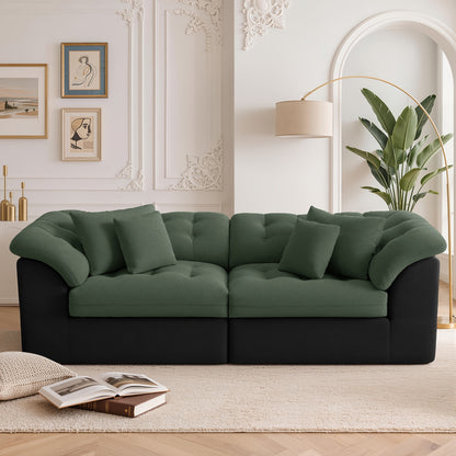 Contrast Modular Cloud Sofa — green cushions with black upholstered base.