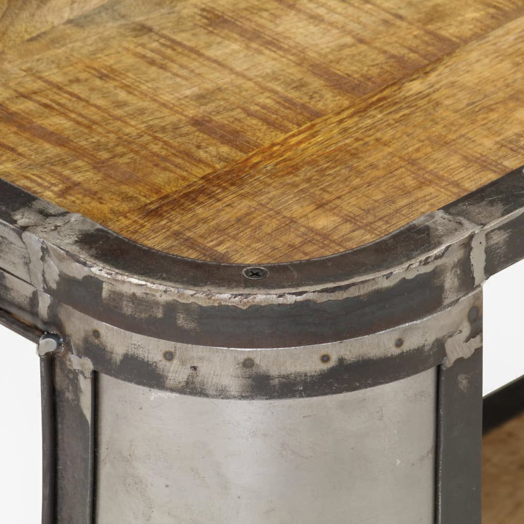 Close-up of the warm wood top and distressed metal edging around the TV stand's rounded corner.