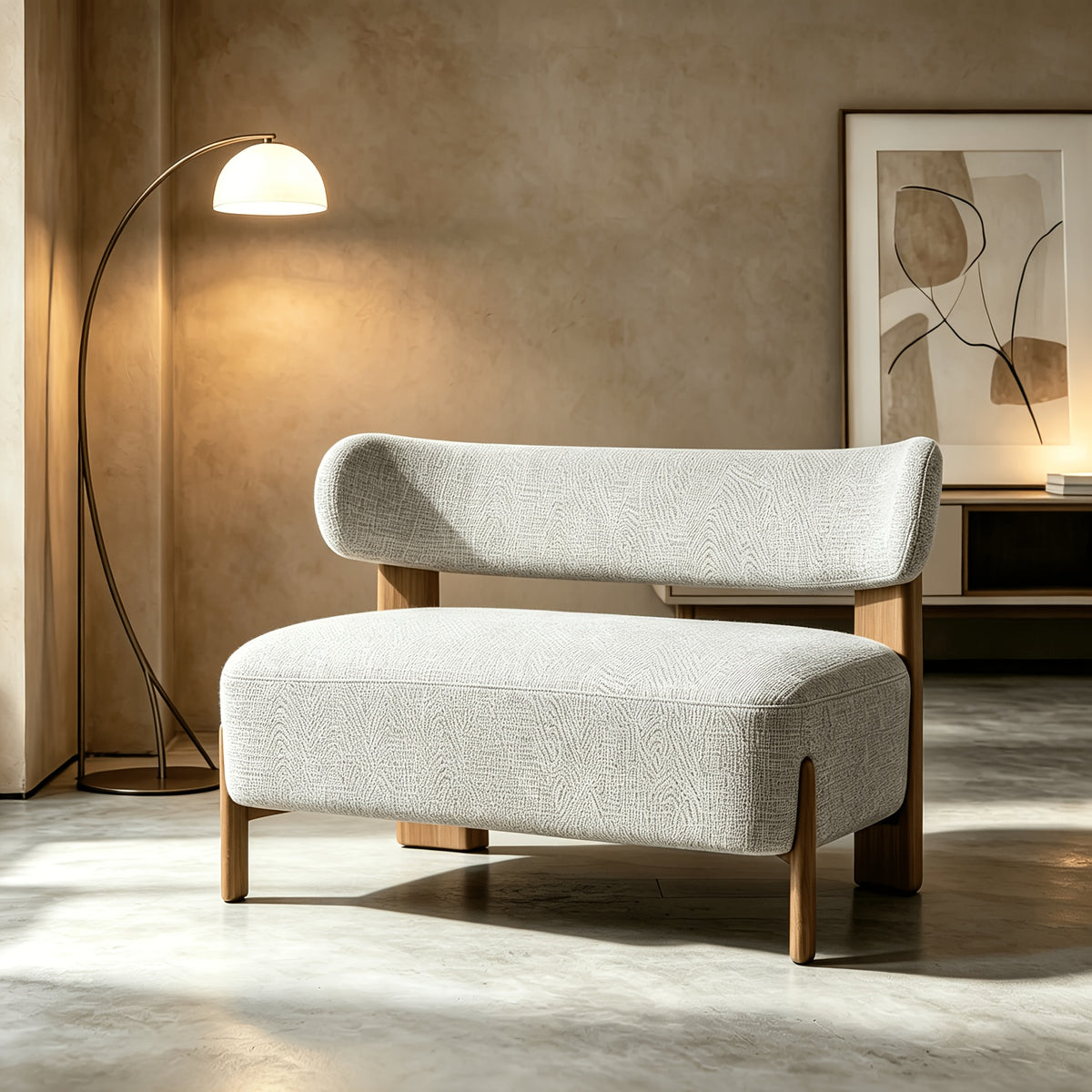 Curved-Back Loveseat with Wood Frame — loveseat in a warm minimalist room.