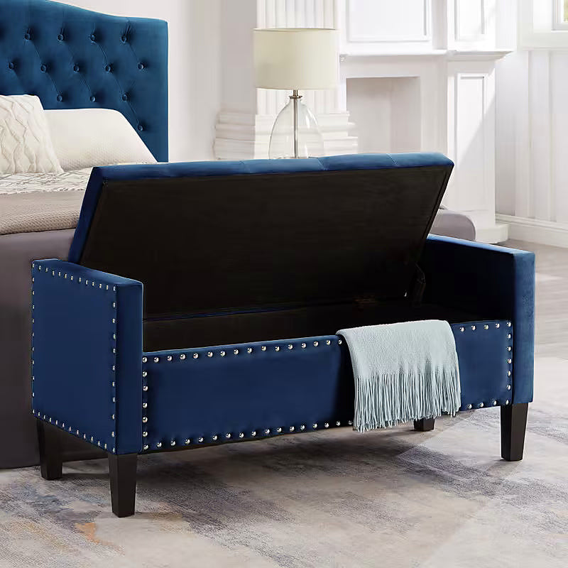Navy storage bench with the lid raised to reveal its dark lined compartment