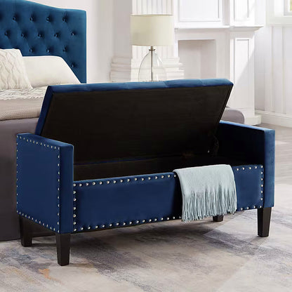 Navy storage bench with the lid raised to reveal its dark lined compartment