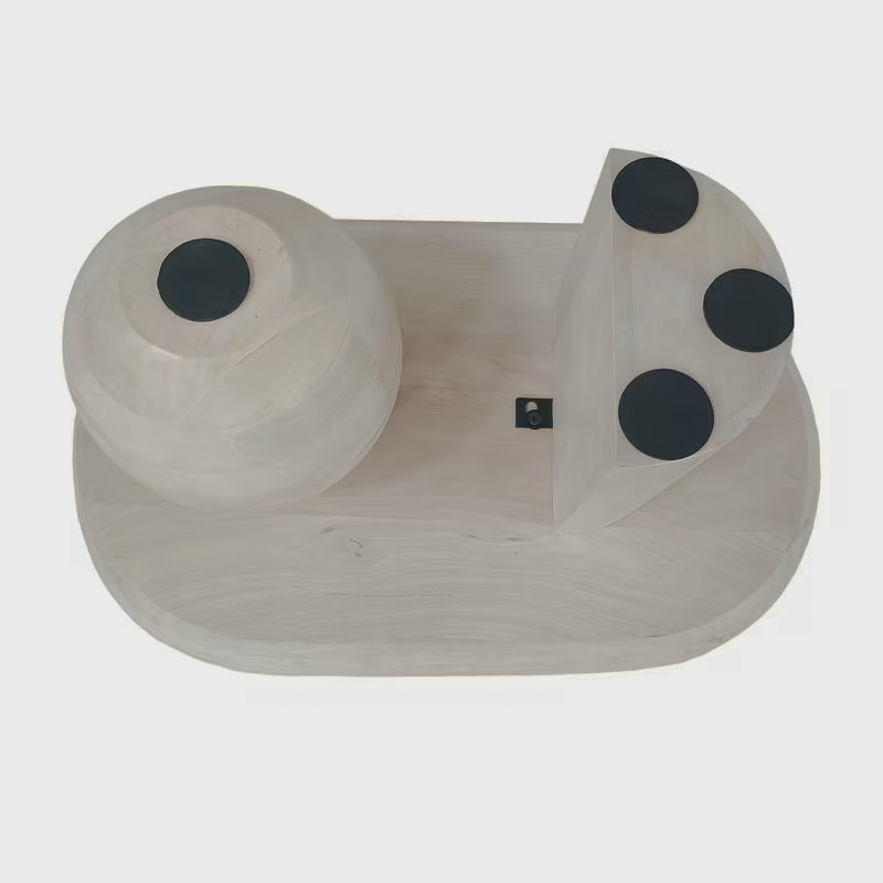 Underside view of the oblong coffee table with protective pads on its supports