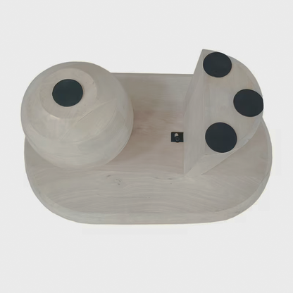 Underside view of the oblong coffee table with protective pads on its supports