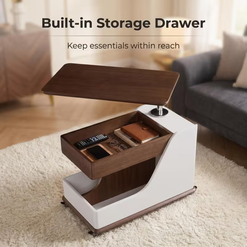 Open side-table drawer containing small items beneath a raised tabletop