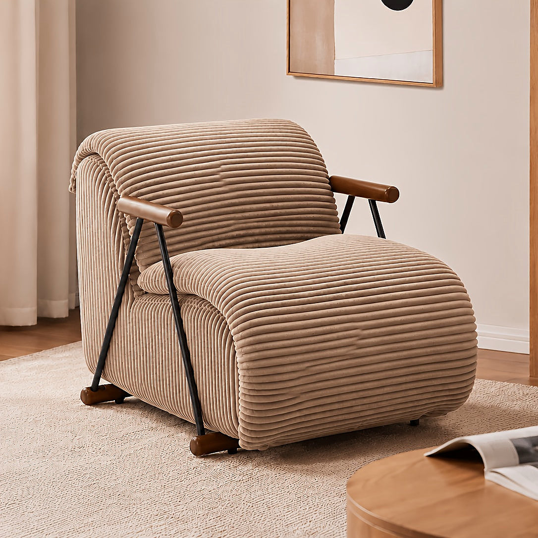 Brown wide corduroy lounge chair with wood arms and a black metal frame