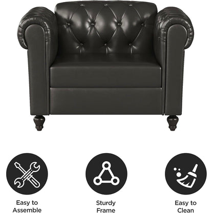 Black faux leather Chesterfield club chair with rolled arms and turned wood feet