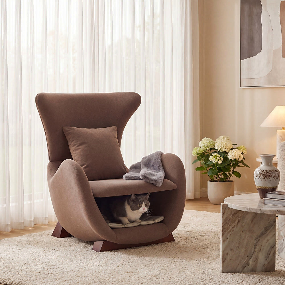 Brown sculptural upholstered accent chair with a curved wood frame and lower storage nook