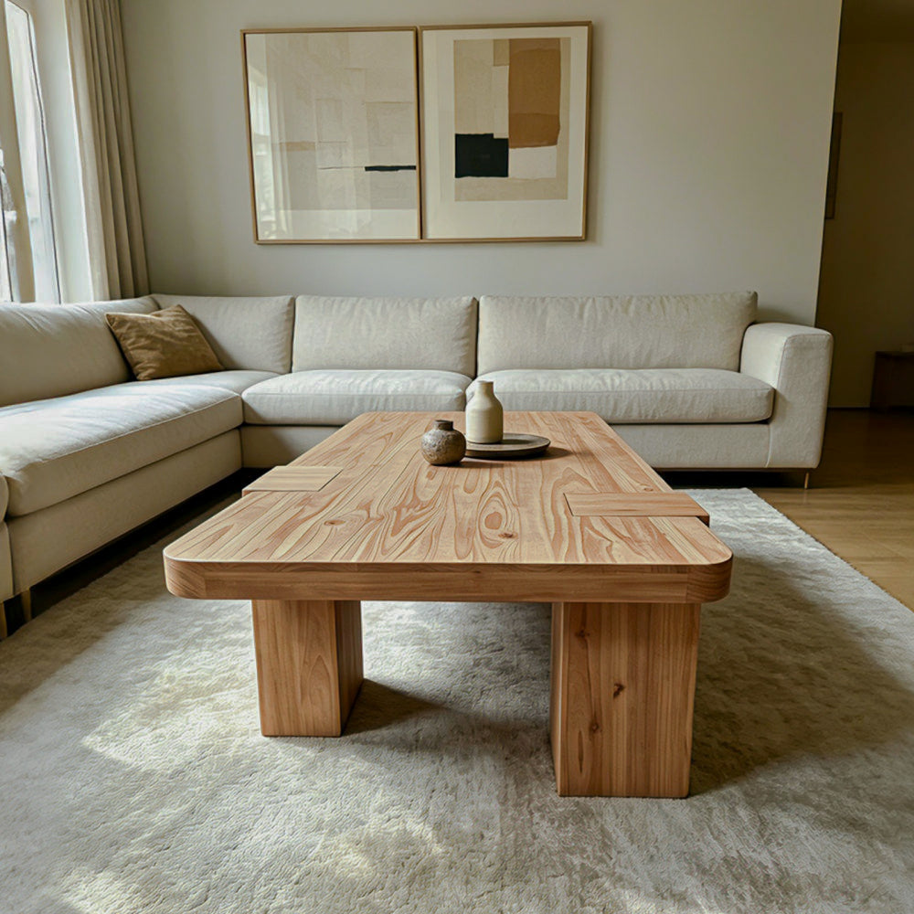 End view of rounded-corner coffee table and broad supports