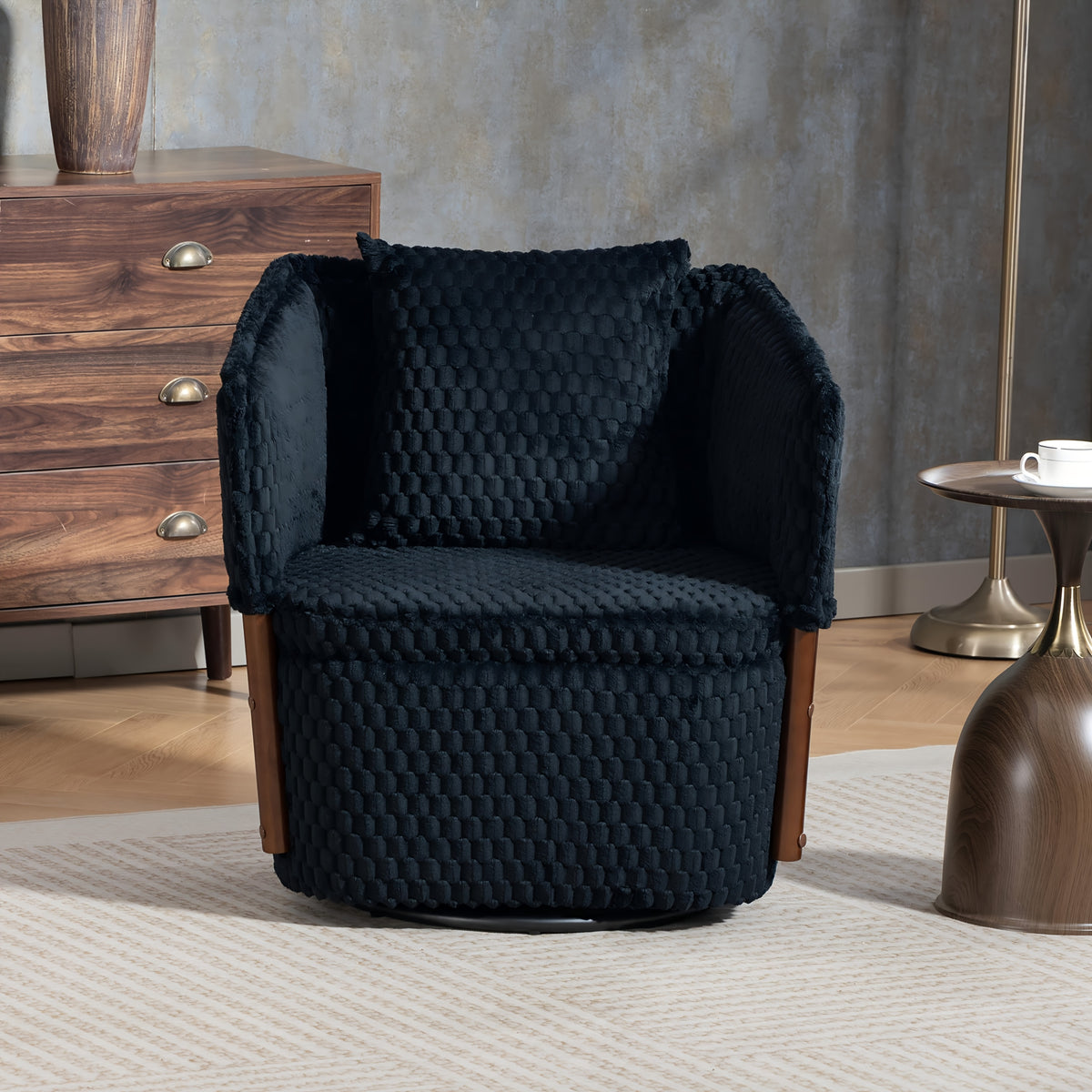 Textured Swivel Accent Chair with Storage — black textured chair in a room