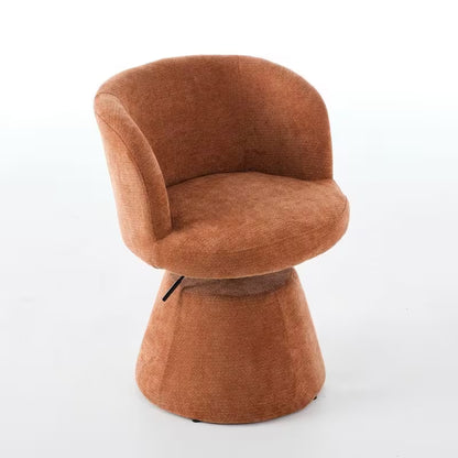 High angled view of the terracotta chair's rounded seat and curved back