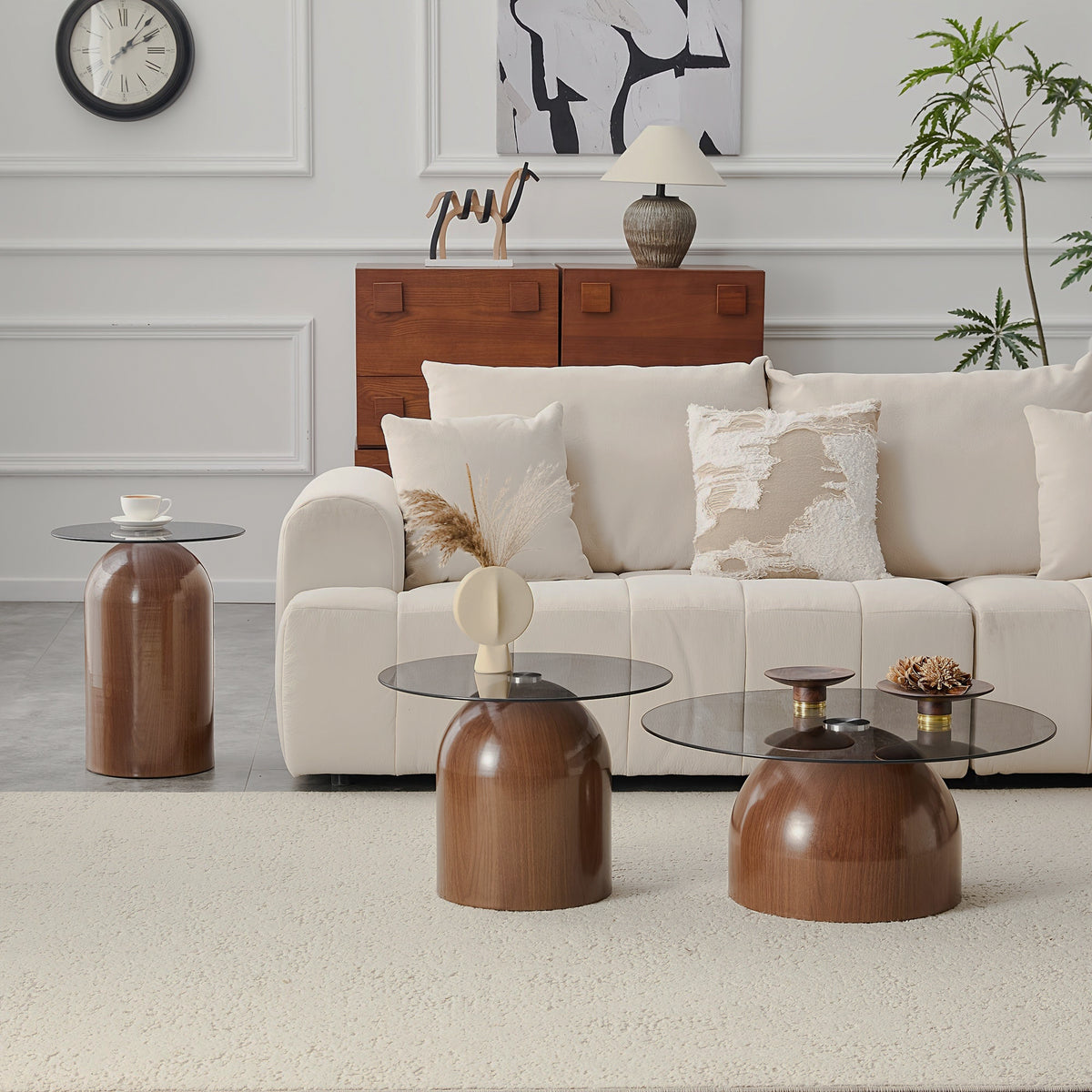 Three brown tables by sofa