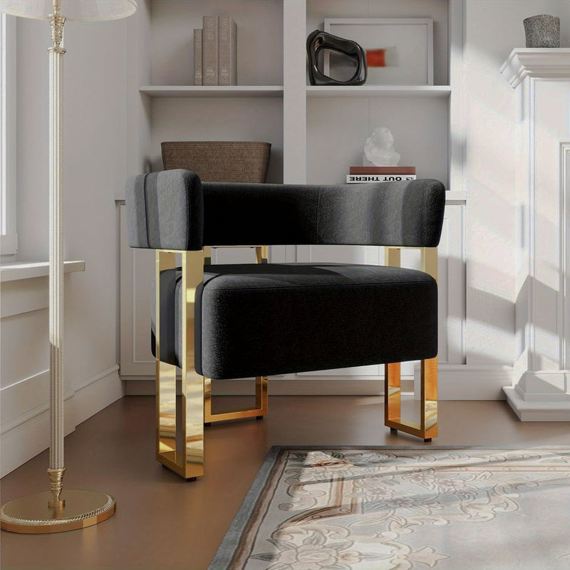 Cutout-Back Accent Chair with Gold-Tone Base — black chair with gold-colored frame in a room