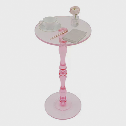 Overhead angled view of the pink round acrylic side table