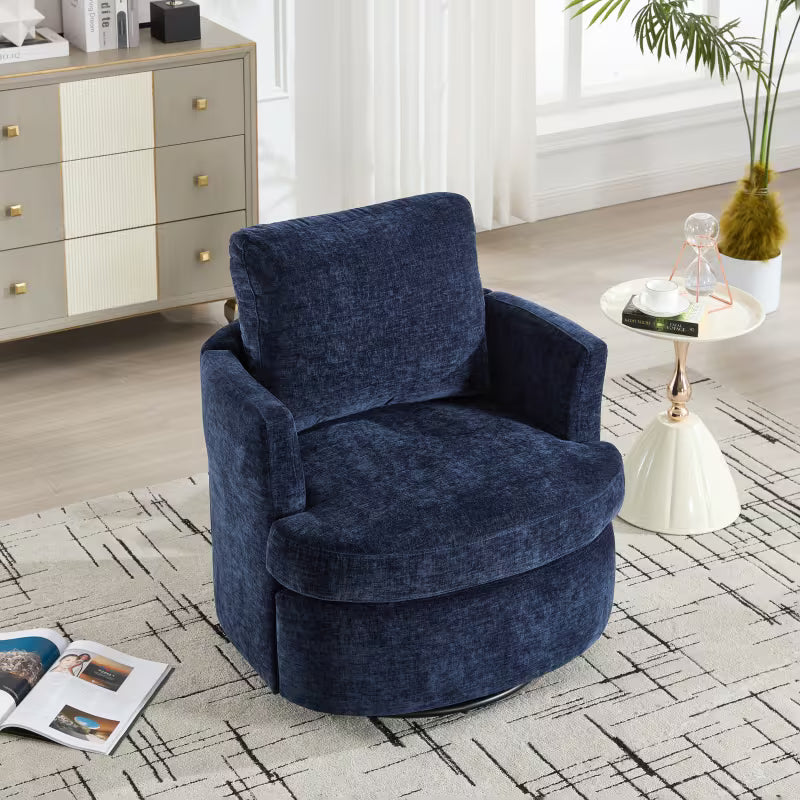 Angled view of the navy barrel chair and its round seat