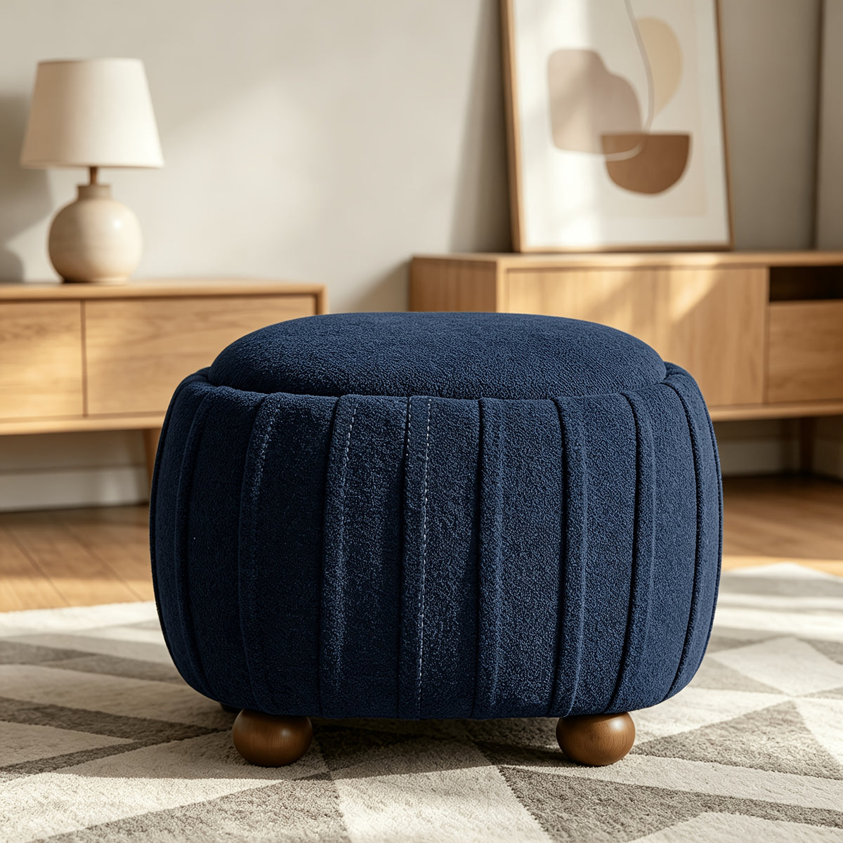 Oval Chenille Storage Ottoman with Wood Ball Legs — navy front three-quarter view