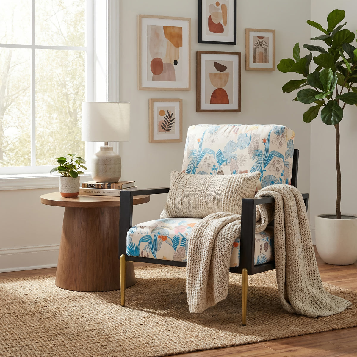 Blue and Orange Floral Velvet Accent Chair — floral chair with cushions beside a window