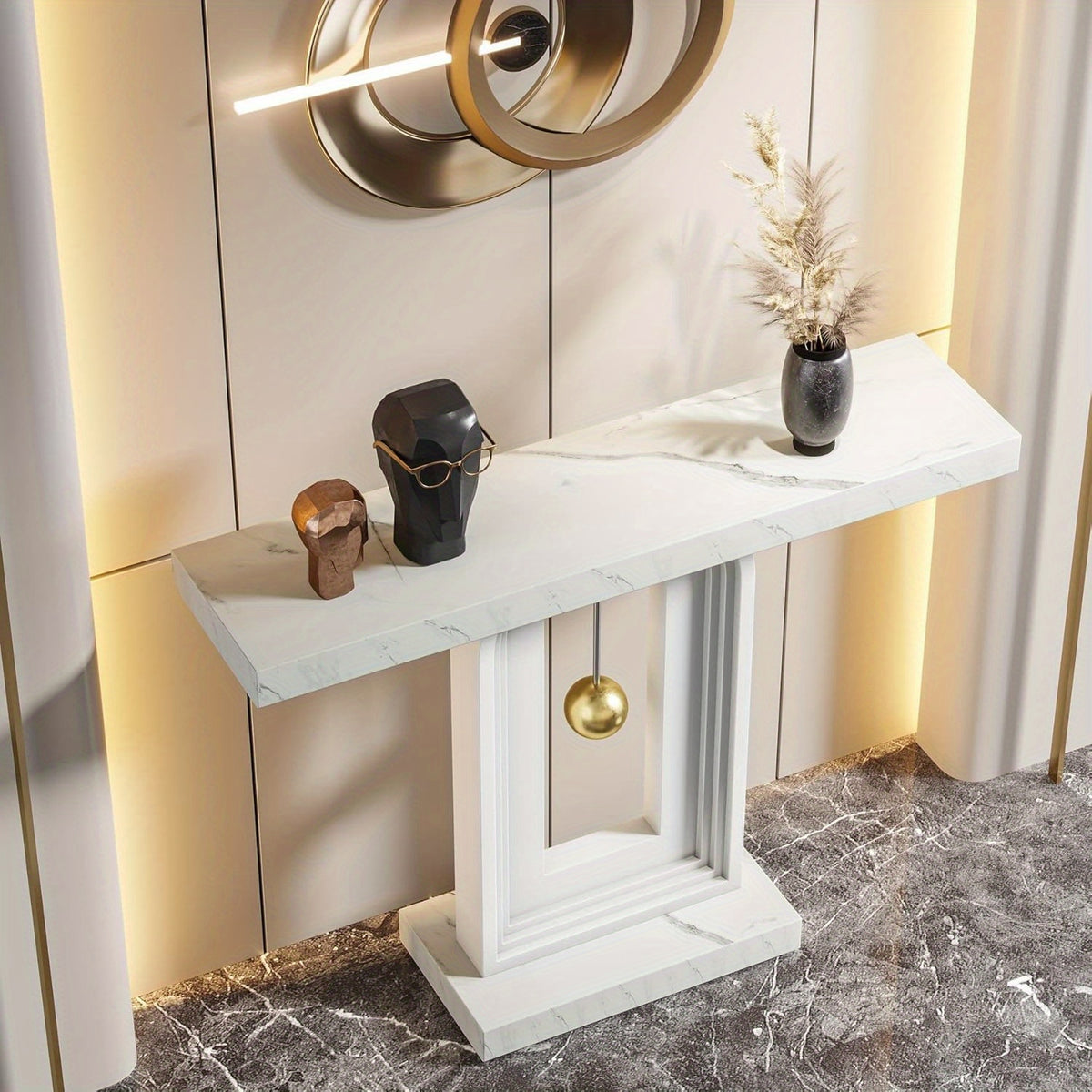 High room angle showing the white console marble-look top and suspended gold sphere
