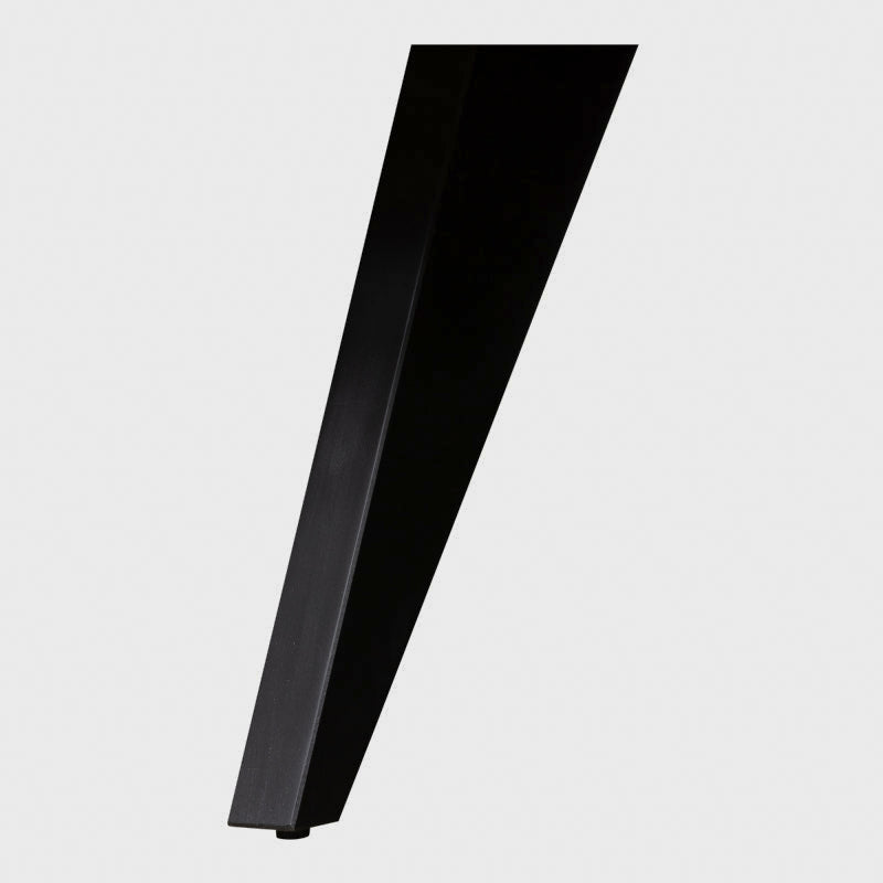 Close-up of a black splayed coffee table leg