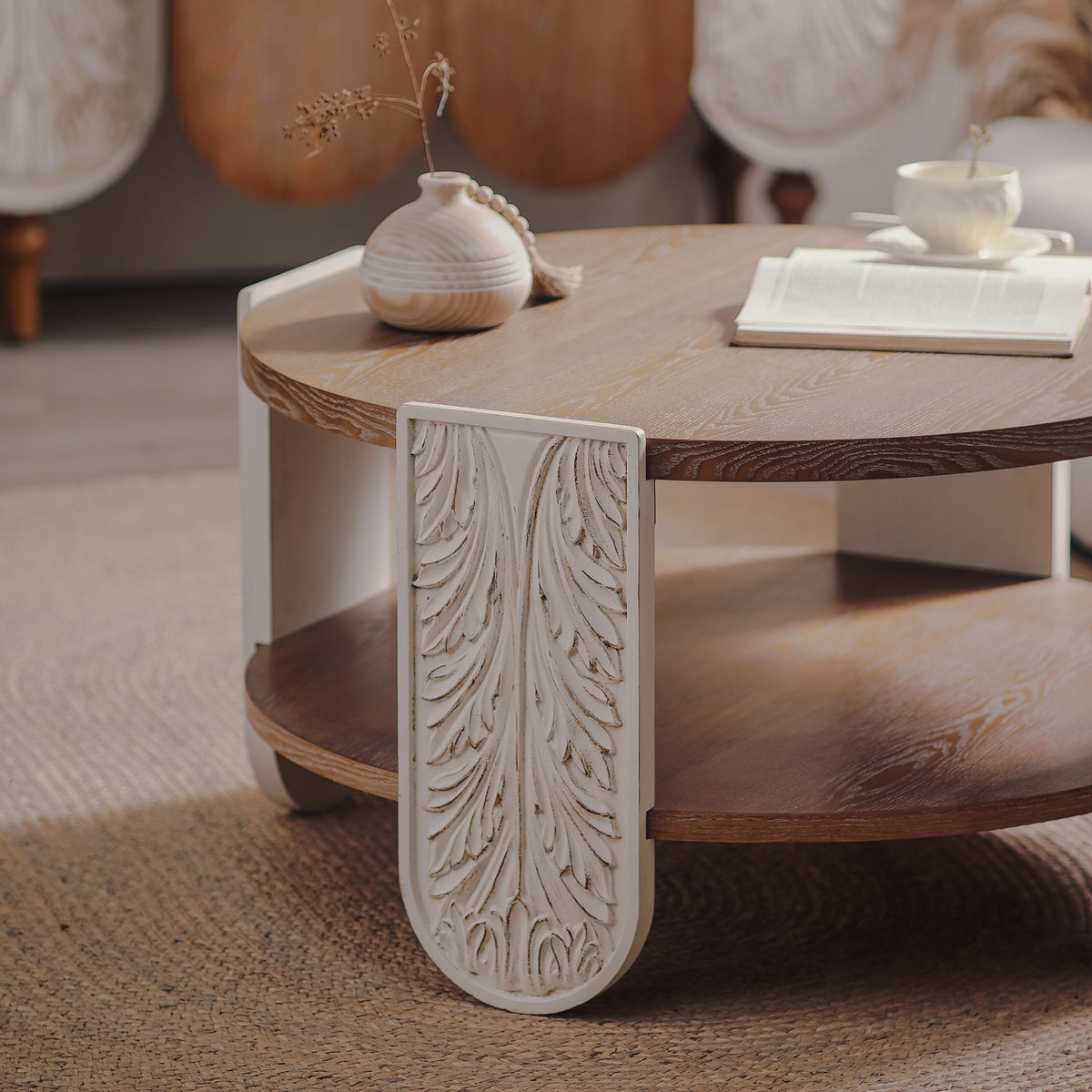 Top and shelf detail on carved-leg round coffee table