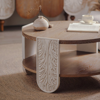 Top and shelf detail on carved-leg round coffee table