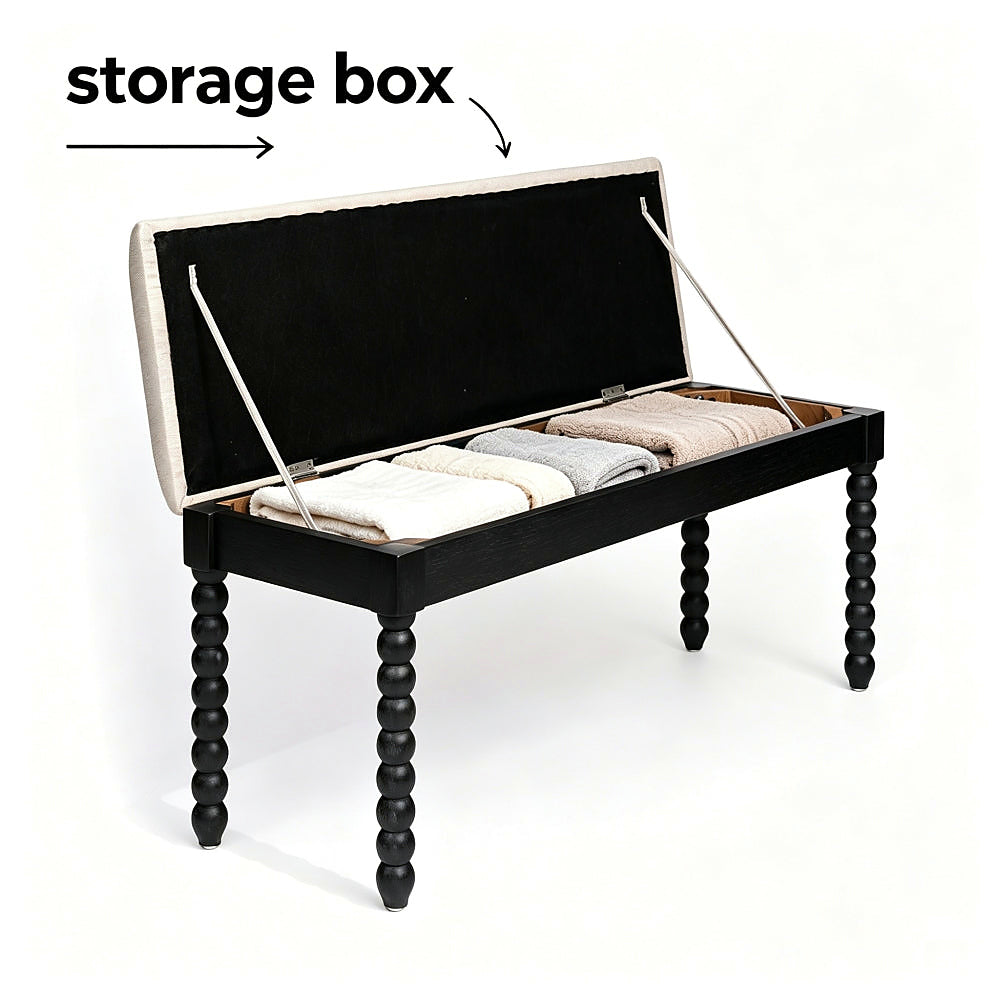 Black Spindle-Leg Storage Bench with the lid raised to show the storage compartment