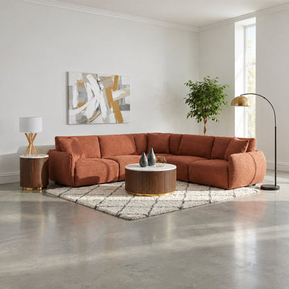 Coral Logan modular sectional with rounded arms in a furnished living room