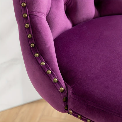 Close-up of purple velvet stool upholstery with nailhead trim and button tufting