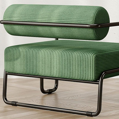Green Ribbed Lounge Chair with Metal Frame — green ribbed upholstery and metal frame close-up