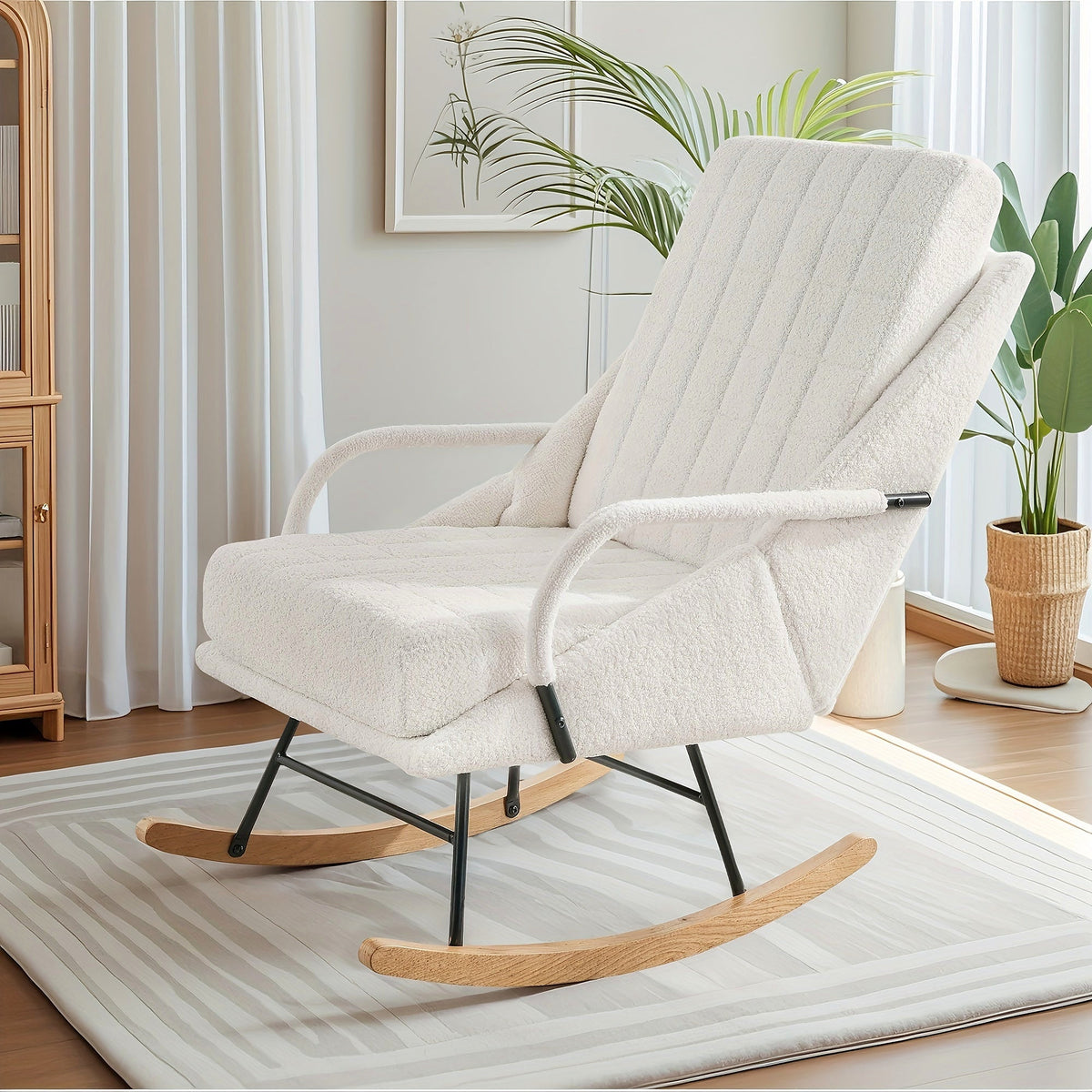 White high back grid stitched rocking chair with wood runners and a black metal support frame