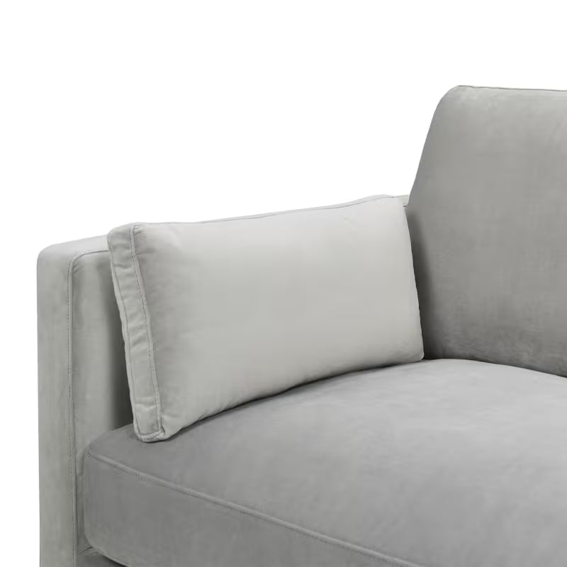 Knox Opal Grey Velvet Sofa — lumbar pillow and arm detail.