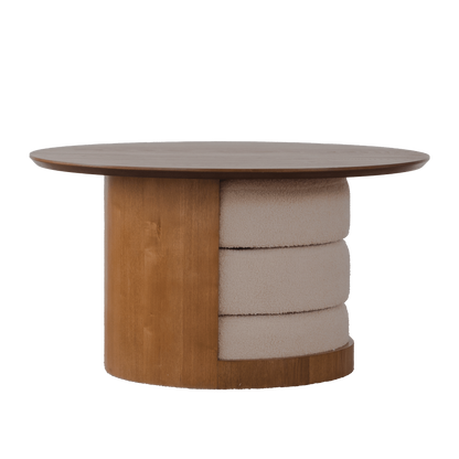 Studio view of the round table with three upholstered stools nested in its base