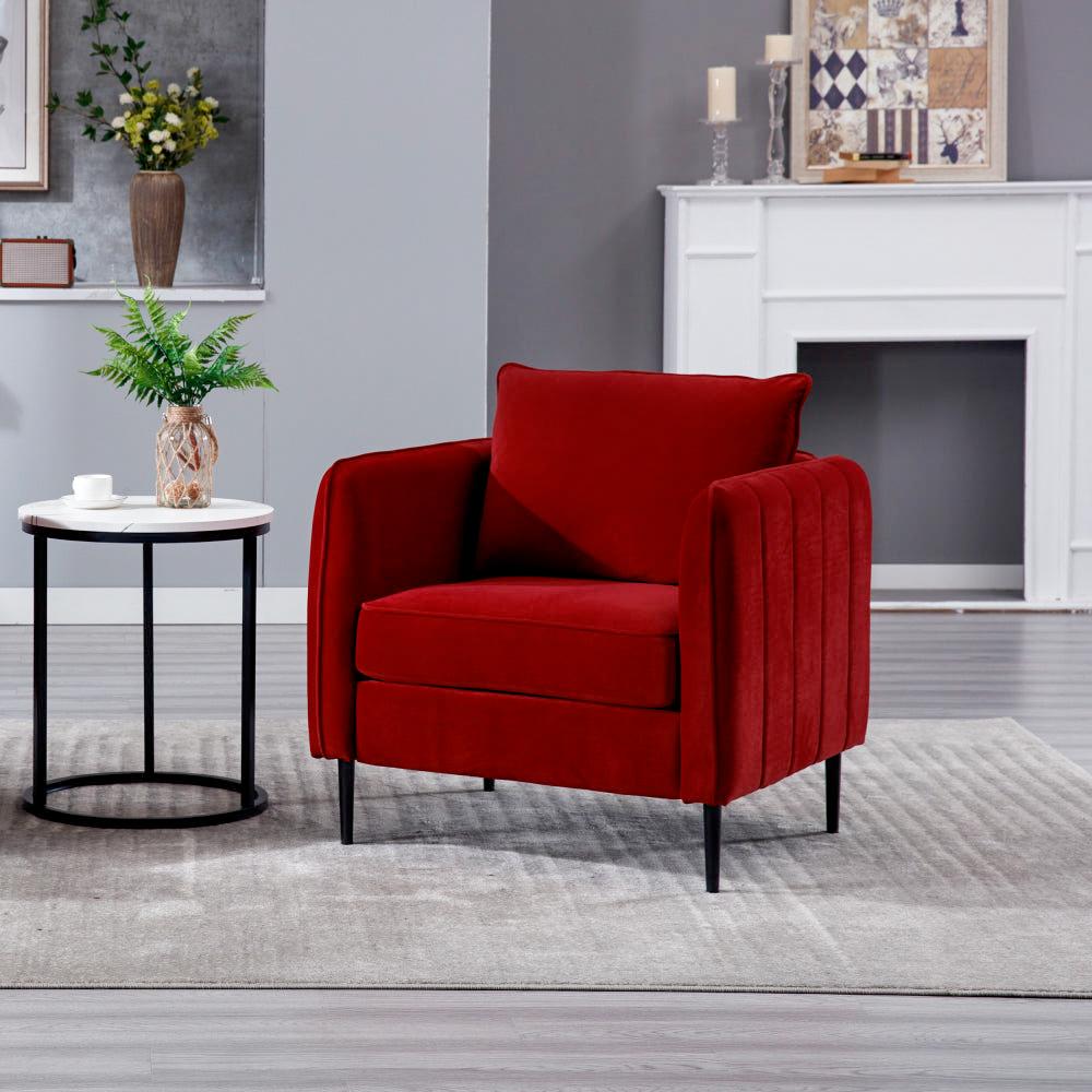 Burgundy upholstered accent armchair with vertically channeled arms and slim dark legs