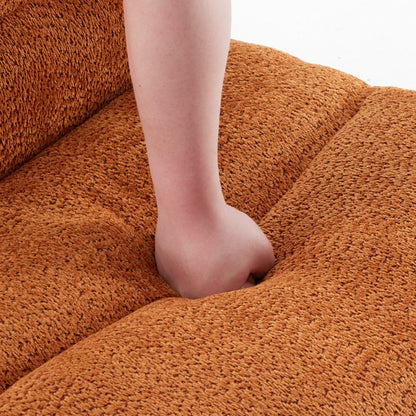 Burnt Orange Textured Armless Lounge Chair — seat cushion compression close-up