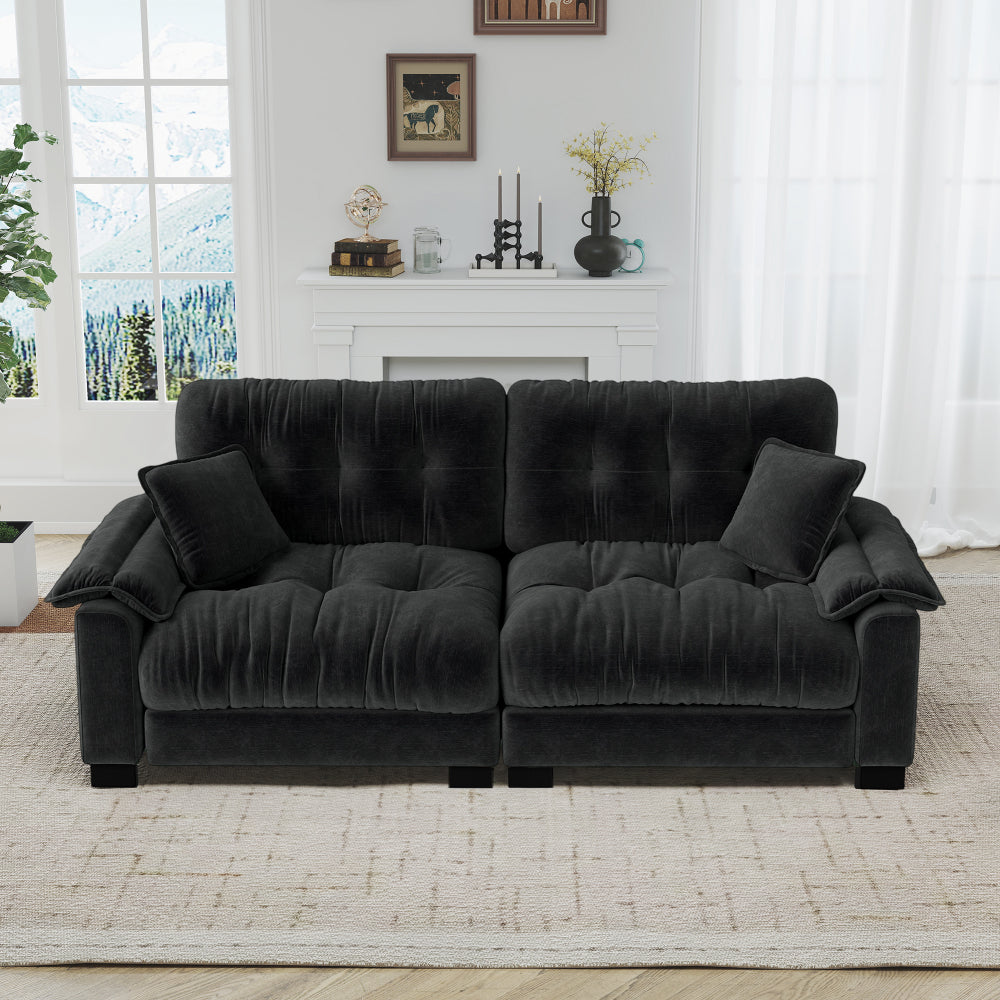 94-Inch Pleated Three-Seat Sofa — black front view in a living room