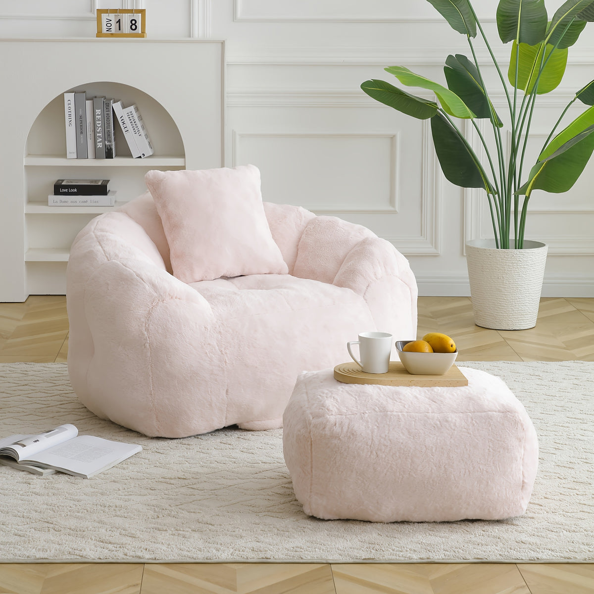 Seashell Faux Fur Lounge Chair with Footrest — pink chair and matching footrest.