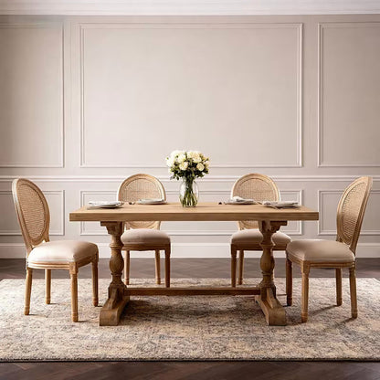 French style dining chair with a woven rattan back and beige upholstered seat