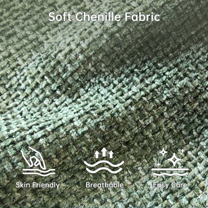Close-up of the green chenille upholstery showing its woven texture.