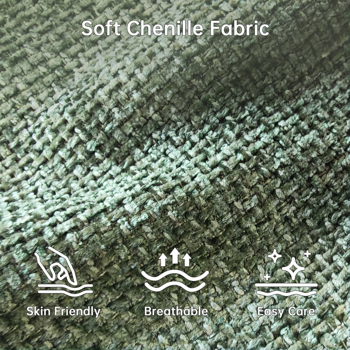 Close-up of the green chenille upholstery showing its woven texture.
